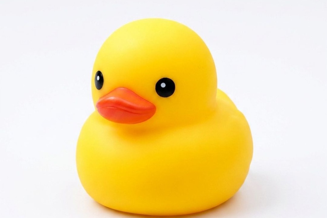 Jumbo Duck Squishy Toy being gently squeezed